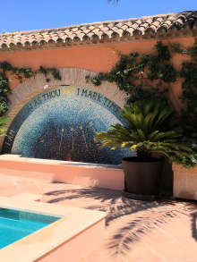 pool with mosaic mural at Casa Mosaica
